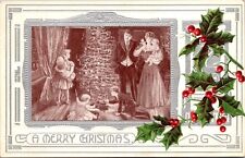 Christmas Postcard Family Gathered Around Candlelit Tree Playing with Toys~3926 picture