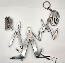 Five (5) Small Multi tools unbranded picture