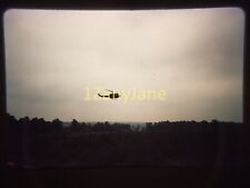 XXPR07 Vintage 35MM SLIDE Photo HELICOPTER FLYING OVER WOODED AREA picture