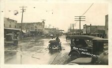Postcard RPPC Buck Burnett Texas 1920s Main Street automobiles 23-7656 picture