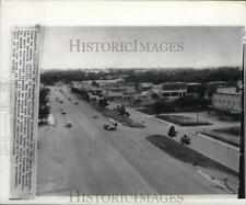1957 Press Photo Cars on the main street of the US occupied Agana island in Guam picture
