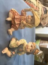 vintage boy and girl figurines picture