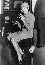 Flapper sitting on a desk smoking 1920 Old Historic Photo picture