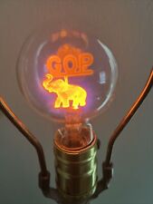 Vintage Aerolux Light Bulb GOP Elephant Republican Party Works Glows Orange picture