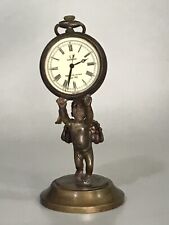 Antique Omega Style Pocket Watch Supported by Brass Winged Cherub 4.7” Tall picture