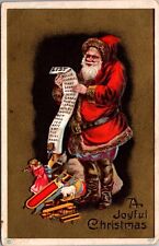 Christmas Postcard Santa Claus Standing in a Pile of Toys Reading List of Names picture