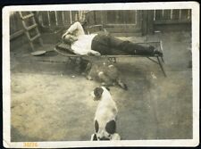 funny man rest w dogs in garden, Vintage fine art Photograph, 1930's picture