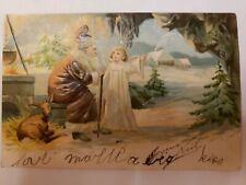 1905 Santa Claus Brown Robe Father Christmas Deer Angel in Cave Postcard Embosse picture