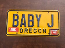 Vintage 1970's 1980's Oregon Vanity License Plate BABY J 1988 tag sticker yellow picture