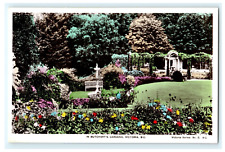 In Butchart's Gardens Victorian BC Canada RPPC Hand colored - Stained Backside picture