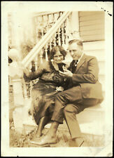 c1920 Photograph of Couple holding a CELL Phone? Must be Notebook but Wow picture