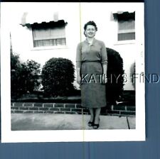 FOUND B&W PHOTO E+4415 PRETTY WOMAN IN DRESS POSED BY HOUSE picture
