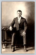 RPPC Serious Man In Suit w/ Classic Haircut Style VINTAGE Postcard AZO 1918-1930 picture