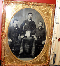 Quarter plate size Tintype of three young men in brass mat/frame picture