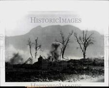 1944 Press Photo Smoke rises from ghostly frames of shattered buildings, Italy picture