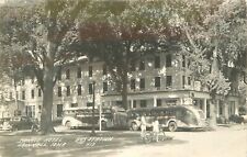 Postcard Iowa Grinnell RPPC Monroe Hotel Bus Station Buses Cook 23-1897 picture