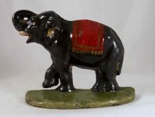 Antique Cast Iron Doorstop Colorful Elephant Raised Trunk & leg on Green Base picture