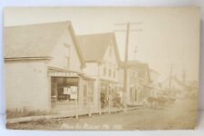 RPPC Blaine Maine Main Street 108 Store Fronts Horse Buggies Men Early 1900's picture