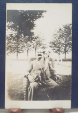 Antique 1907-1914 RPPC Man & big Dog in his Lap, Wicker Chair, Mustache picture