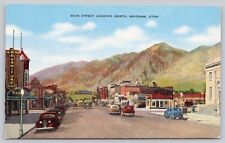 Postcard Brigham Utah Main St Showing Businesses and Vintage Autos picture