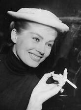 Actress Anita Ekberg smiling smoking a cigarette arrives Copenh- 1956 Old Photo picture