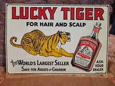 NEW OLD STOCK NOS EMBOSSED LUCKY TIGER HAIR & SCALP KANSAS CITY TIN METAL SIGN picture