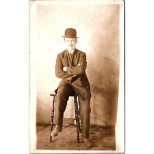 RPPC Man in Suit And Top Hat Sitting On Stool Azo Vintage Postcard Real Photo picture