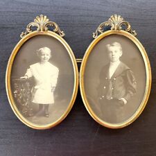 Antique Double Framed Brass Hanging Oval Picture Frame With Original Photographs picture