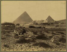 Hotel Mena-House et pyramides,people sitting on rocks,Mena House Hotel,Egypt picture