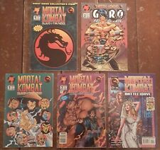 Midway Mortal Kombat Comics fair to good condition. Five comics in total. picture