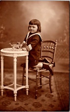 RPPC Young Boy Sailor Suit Bangs Haircut Studio Posed Furniture Toy (N-280) picture
