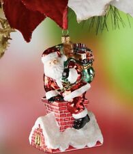 New Neiman Marcus Santa carrying gift bag on chimney glass  Christmas Ornament picture
