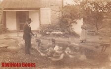 RPPC Postcard Man Feeding Ducks c. 1900s picture