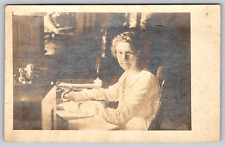 RPPC c1910s Lady Sitting At Desk Writing Candlestick Telephone Land LIne picture