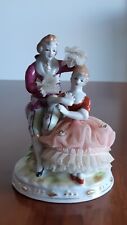 Vintage Porcelain Lace Sitting Couple picture