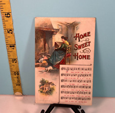 1909 Home Sweet Home with song with lyrics  woman playing piano postcard. picture