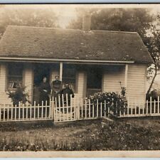 c1910s Family Portrait at Small House RPPC White Picket Fence Real Photo A74 picture