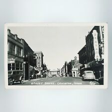 Lewiston Idaho Main Street RPPC Postcard 1940s Cafe Hotel Drug Store Cars H633 picture