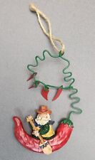 Southwestern Christmas Ornament Cowboy Santa Riding Red Chili Pepper Canoe Boat picture