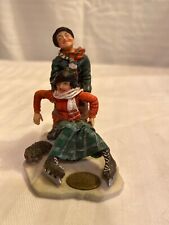 Skating Couple The Saturday Evening Post 1999 Christmas Village Figurines picture