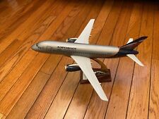 Model of the SSJ-100 aircraft on a stand scale 1:144 picture