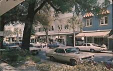Winter Park,FL Park Avenue is lined with Distinctive Shops and Patio Gardens to picture
