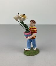 Department 56 Snow Village Easter Lily’s Nursery 2” Boy Figure w/ Lily Plant picture