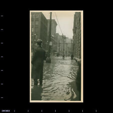 Vintage Photo DOWNTOWN FLOODED STREET SCENE MAN REAR VIEW FROM BEHIND picture