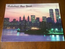Fabulous New York, New York Dusk Skyline Postcard picture