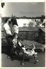 1983 Press Photo A couple stops to kiss at Niagara Falls, New York - hcw10847 picture