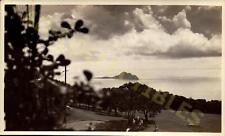 Vintage Found Snapshot Photograph  Scenic Coastal View with Cloudy Skies picture