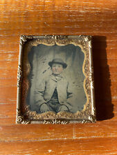 1/6th Size Tintype of young boy wearing hat in brass mat/frame hand tinted picture