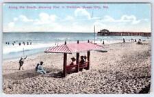 1910's OCEAN CITY MD MARYLAND ALONG BEACH PIER IN DISTANCE CHESSLER POSTCARD picture