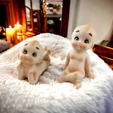 TWO Adorable Vintage Porcelain Bisque KEWPIE Doll Piano Baby Figure Figurine picture